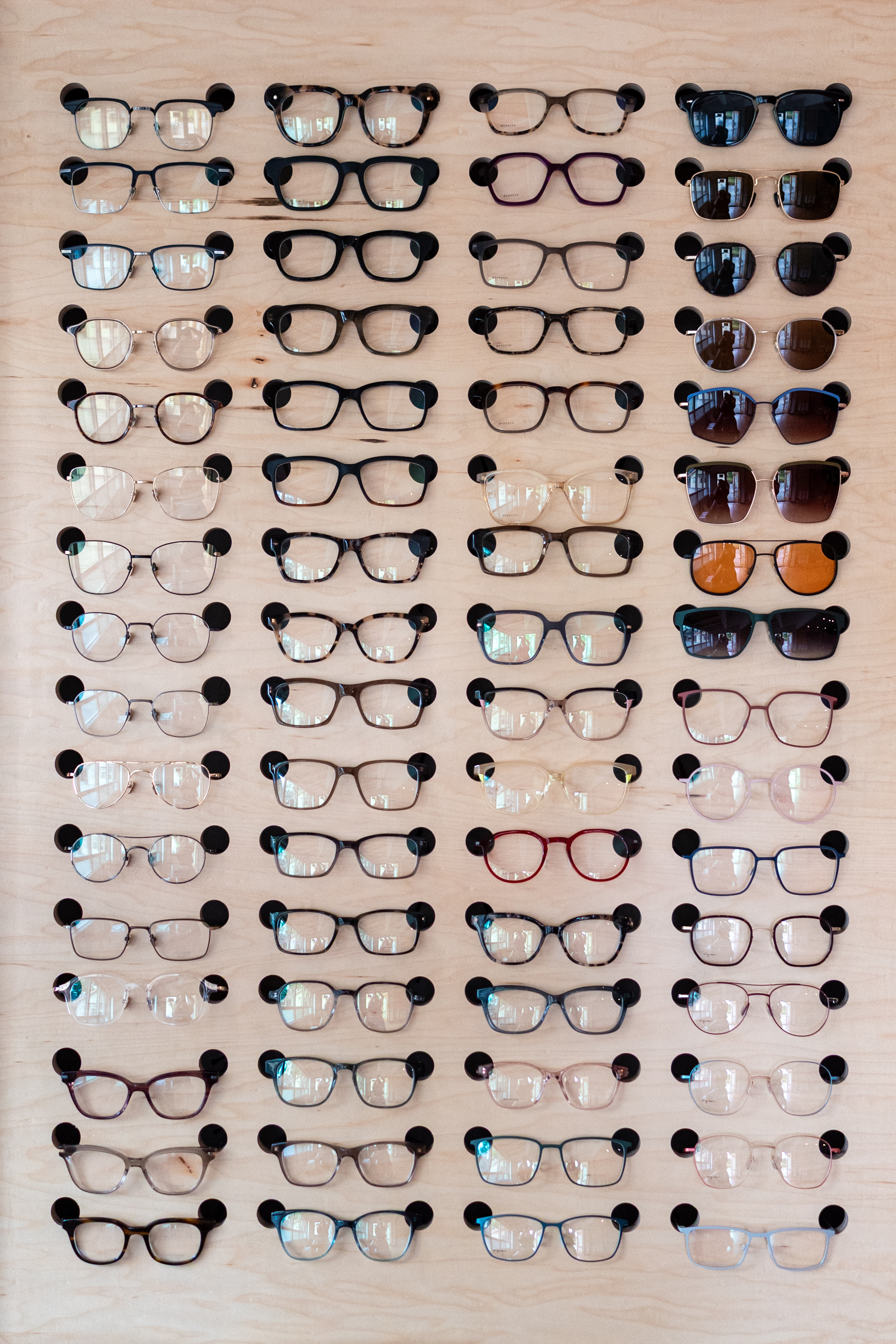 Glasses wall display at Gilman Glasses
